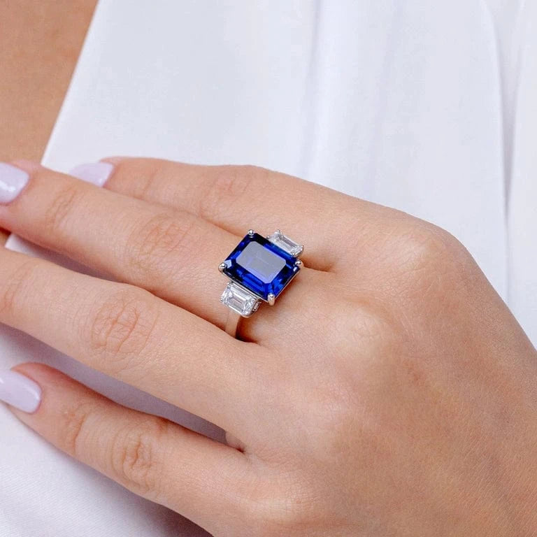 Emerald-Cut Royal Blue Hue Lab-Certified Blue Sapphire - Three Stone Classic Engagement Ring 14K Yellow Gold Plated (Includes GRC Certification from Gemstone Research Center)