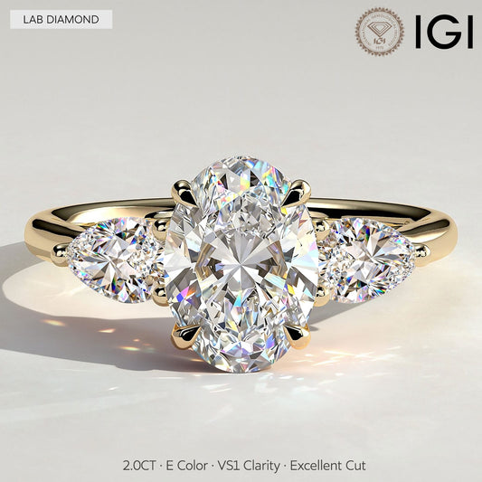 gona- 2ct Oval Lab-Grown Diamond Three-Stone Ring with Pear Accent Stones (Moissanite) Open Trellis Gallery Claw Setting Tarnish-resistant Silver In 14K Gold Plated (Includes IGI Certification from International Gemological Institute)