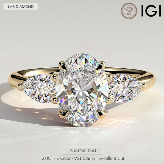 gona- 2ct Oval Lab-Grown Diamond Three-Stone Ring with Pear Accent Stones (Moissanite) Open Trellis Gallery Claw Setting Solid 14K Yellow Gold (Includes IGI Certification from International Gemological Institute)