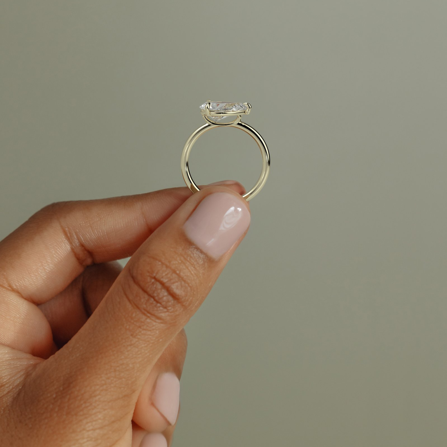 2ct Pear Lab-Grown Diamond East-West Claw Solitaire with Raised Basket Gallery Engagement Ring in Solid 14K Yellow Gold (Includes IGI Certification from International Gemological Institute)