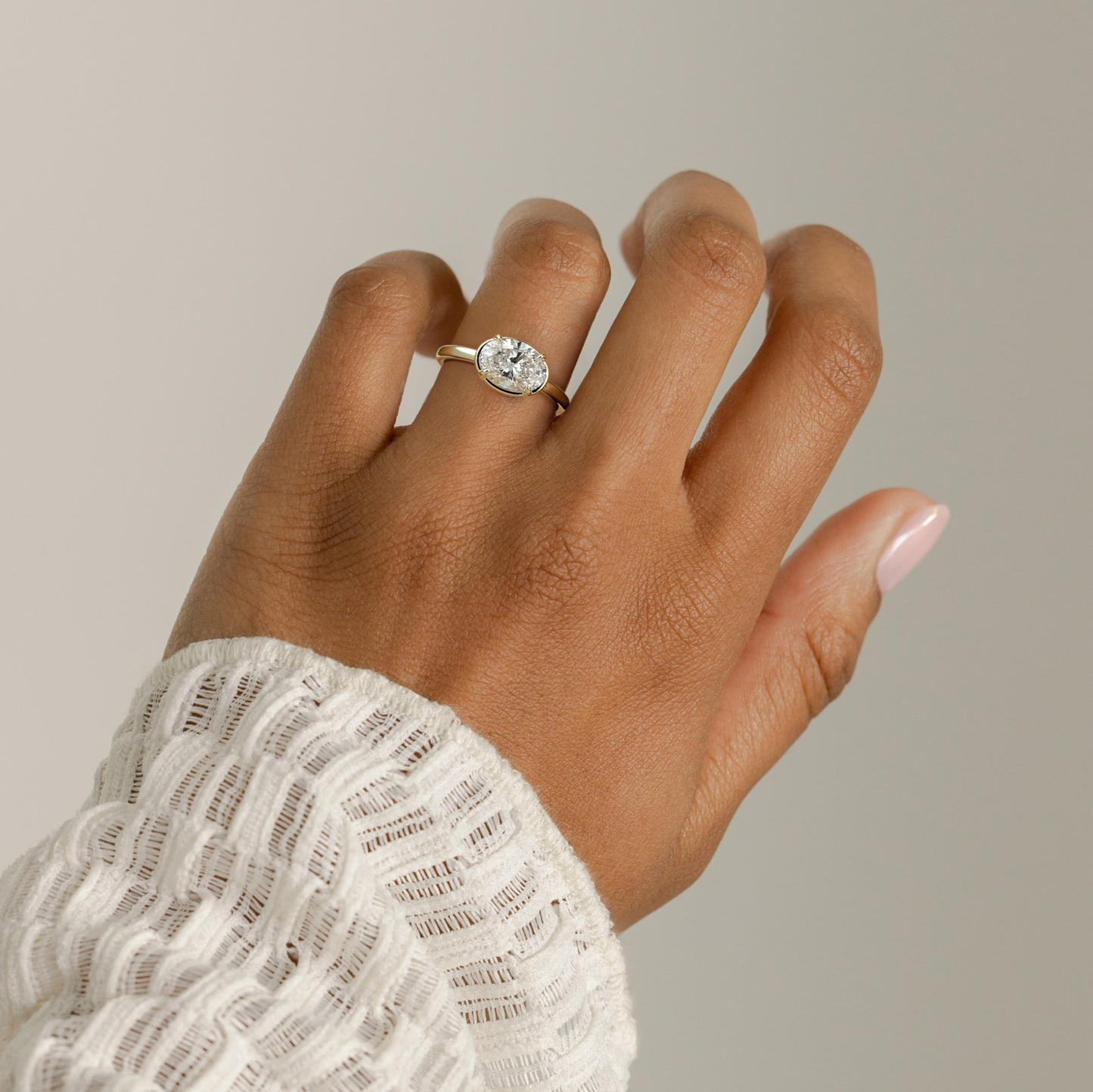 2ct Oval Lab-Grown Diamond East-West Claw Solitaire with Bezel Frame Engagement Ring in Solid 14K Yellow Gold (Includes IGI Certification from International Gemological Institute)