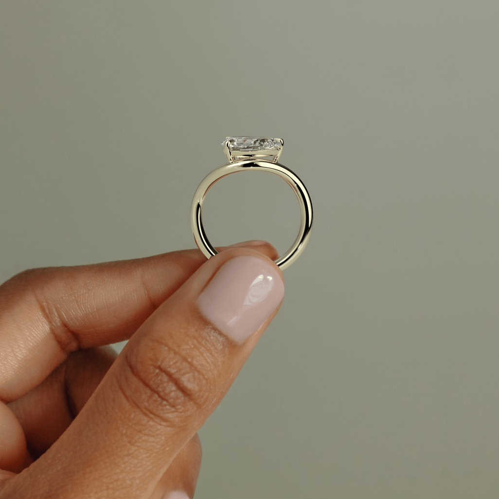 2ct Pear Lab-Grown Diamond Ring in East-West Setting with Wave Band Claw Setting Tarnish-resistant Silver In 14K Gold Plated (Includes IGI Certification from International Gemological Institute)