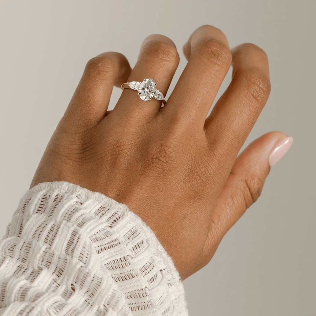 2ct Oval Lab-Grown Diamond Three-Stone Ring with Pear Accent Stones (Moissanite) Open Trellis Gallery Claw Setting Tarnish-resistant Silver In 14K Gold Plated (Includes IGI Certification from International Gemological Institute)