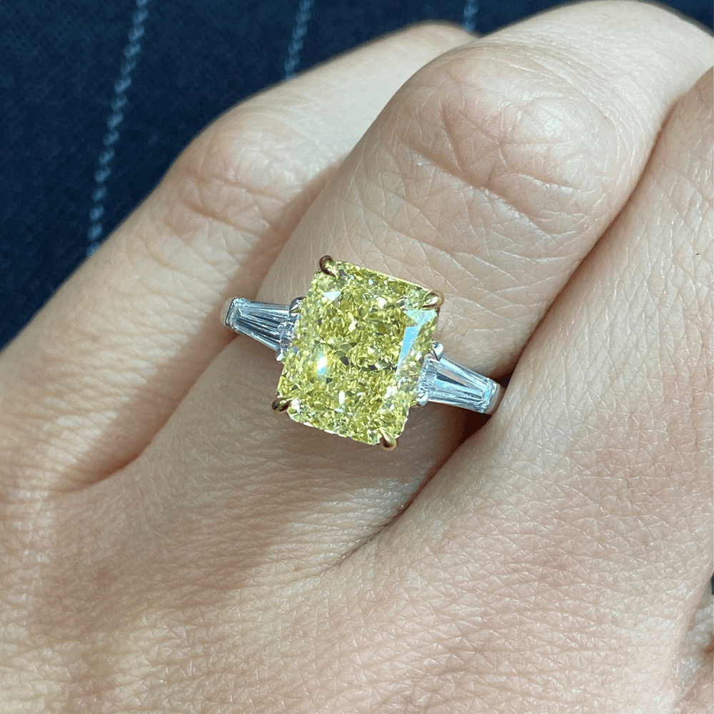Golden Majesty - 3.0 ct Radiant Cut Lab-Grown Fancy Vivid Yellow Diamond Three-Stone Ring with 0.48CT.TW Tapered Baguette Diamond Side Stones In Tarnish-resistant Silver (Includes IGI Certification from International Gemological Institute)