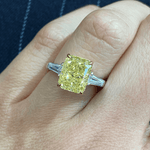 Golden Majesty - 3.0 ct Radiant Cut Lab-Grown Fancy Vivid Yellow Diamond Three-Stone Ring with 0.48CT.TW Tapered Baguette Diamond Side Stones In Tarnish-resistant Silver (Includes IGI Certification from International Gemological Institute)
