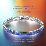 Limited Time Weekend Gift (Valid Friday – Monday): Spend $350+ in a Single Purchase to Get This Sapphire Blue Pavé Slim Stacking Bangle Bracelet in White Gold Plated for FREE (Ships With Order, No Need to Add to Cart)