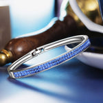 Limited Time Weekend Gift (Valid Friday – Monday): Spend $350+ in a Single Purchase to Get This Sapphire Blue Pavé Slim Stacking Bangle Bracelet in White Gold Plated for FREE (Ships With Order, No Need to Add to Cart)