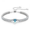 1.60 CT Santa Maria Vivid Blue Lab-Created Aquamarine Heart-Cut Center Stone Tennis Bracelet, March Birthstone Bracelet in White Gold-Plated Tarnish-Resistant Silver (Includes GRC Certification from Gemstone Research Center)