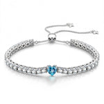 1.60 CT Santa Maria Vivid Blue Lab-Created Aquamarine Heart-Cut Center Stone Tennis Bracelet, March Birthstone Bracelet in White Gold-Plated Tarnish-Resistant Silver (Includes GRC Certification from Gemstone Research Center)