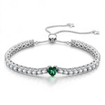 1.30 CT Muzo Green Lab-Created Emerald Heart-Cut Center Stone Tennis Bracelet, May Birthstone Bracelet in White Gold-Plated Tarnish-Resistant Silver (Includes GRC Certification from Gemstone Research Center)