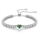 1.60 CT Olive Green Lab-Created Spinel Heart-Cut Center Stone Tennis Bracelet, August Birthstone Bracelet in White Gold-Plated Tarnish-Resistant Silver (Includes GRC Certification from Gemstone Research Center)