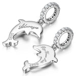 Sterling Silver Leaping Dolphins Charms With Enamel In White Gold Plated
