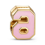 Double Sided Number Six Charm with Sparkling Pave Front and Pink Enamel Back in 14K Gold Plated Tarnish Resistant Silver