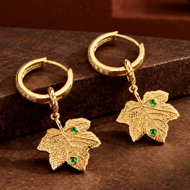 Solid 925 Sterling Silver Hoop Earrings With Maple Leaf Charms And Emerald Green Accents With 14K Gold Plating