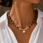Black Onyx & Moissanite Oval-Cut Focal Gemstone Solitaire Pendant Necklace in Tarnish-Resistant Silver with 14K Gold Plating (Comes with Authentic GRA Gemological Research Association Certification)