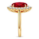 Oval Lab-Grown Ruby Halo Engagement Ring in 14K Yellow Gold Plated Silver