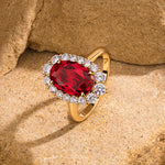 Oval Lab-Grown Ruby Halo Engagement Ring in 14K Yellow Gold Plated Silver