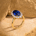 Oval Lab-Grown Sapphire Halo Engagement Ring in 14K Yellow Gold Plated Silver