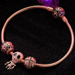 The Skull Mirage Tarnish-resistant Silver Charms Bracelet Set With Enamel In Rose Gold Plated (Includes bracelet and all charms shown)