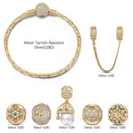 Merry Pearl Tarnish-resistant Silver Charms Bracelet Set In 14K Gold Plated (Includes bracelet and all charms shown) -Created With SWAROVSKI® Pearls