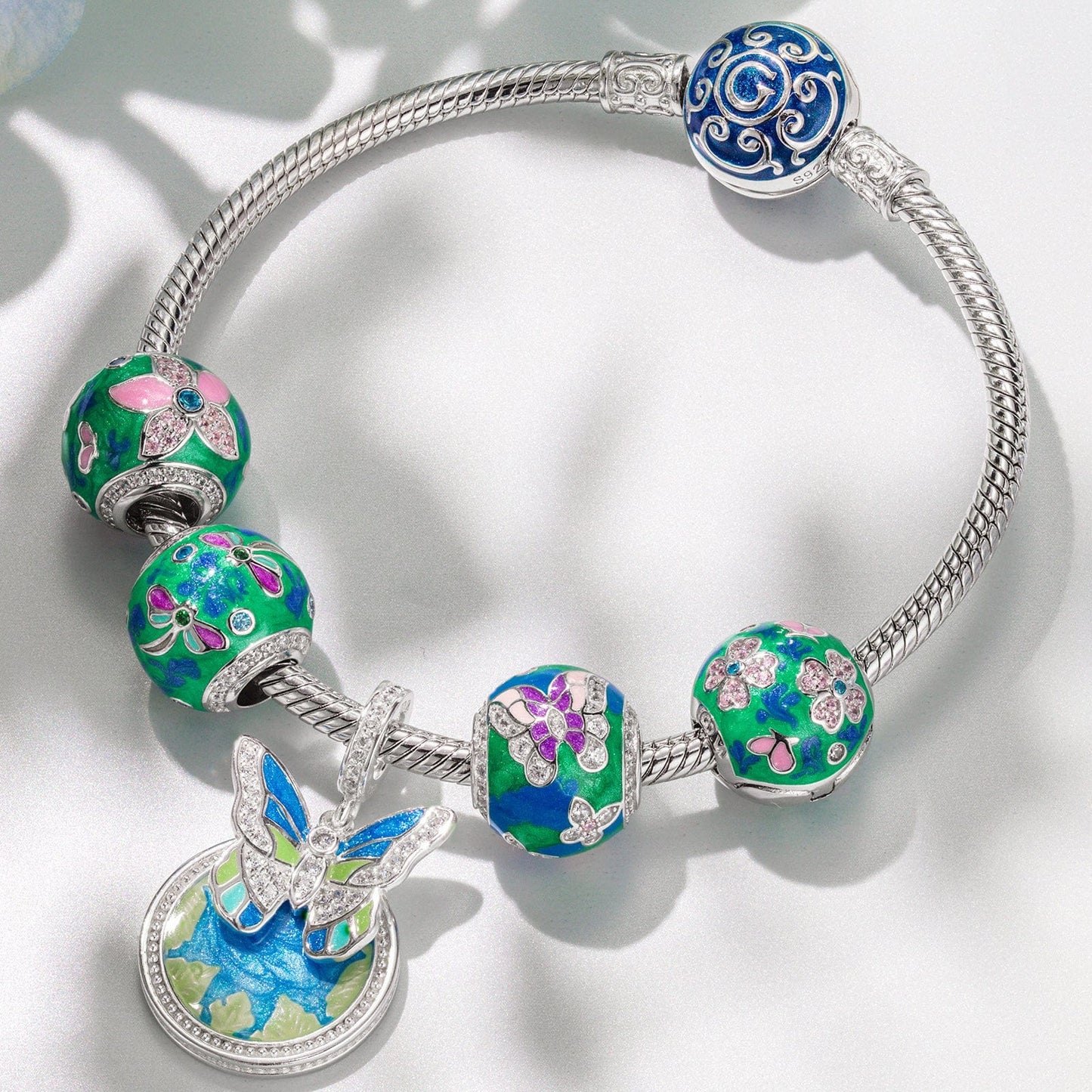 Sterling Silver Emerald Butterfly Dance Charms Bracelet Set With Enamel In White Gold Plated (Includes bracelet and all charms shown)