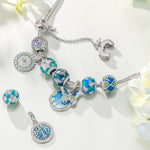 Sterling Silver Emerald Flutter Charms Bracelet Set With Enamel In White Gold Plated (Includes bracelet and all charms shown)