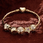 Sterling Silver The Stars Of Versailles Charms Bracelet Set In 14K Gold Plated (Includes bracelet and all charms shown)