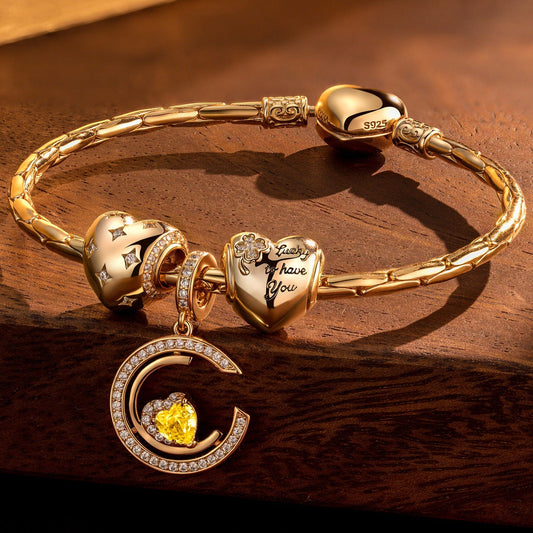 gona- Sterling Silver Gleaming Affection Charms Bracelet Set In 14K Gold Plated (Includes bracelet and all charms shown)