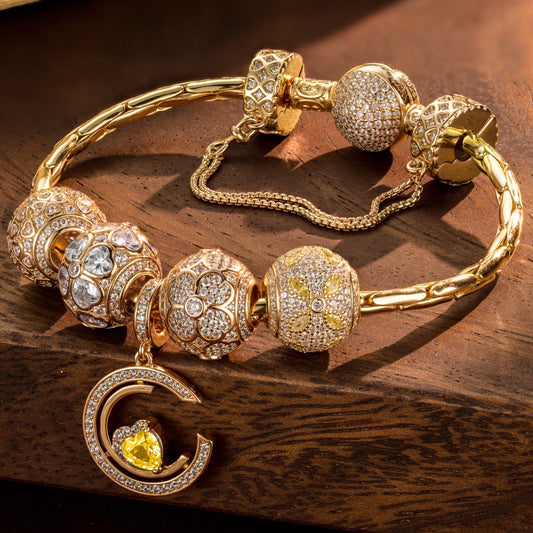 gona- Sterling Silver Heartfelt Clover Charms Bracelet Set In 14K Gold Plated (Includes bracelet and all charms shown)