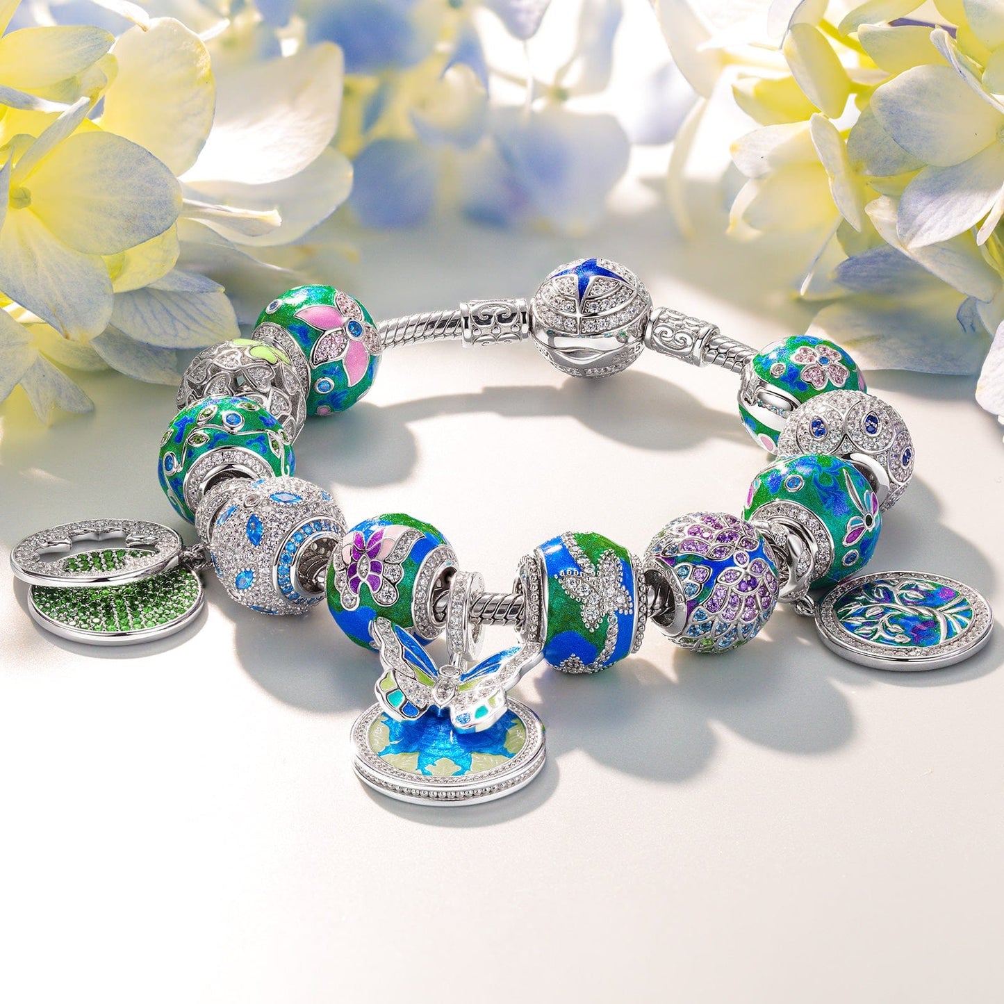 Sterling Silver Emerald Dreamscape Charms Bracelet Set With Enamel In White Gold Plated
