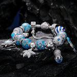 Sterling Silver Marine Life Wonders Charms Bracelet Set With Enamel In White Gold Plated (Includes bracelet and all charms shown)