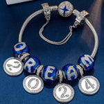 Sterling Silver Dreams' Beginnings Charms Bracelet Set With Enamel In White Gold Plated (Includes bracelet and all charms shown)