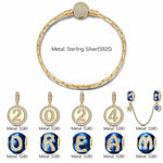 Sterling Silver Dreams' Beginnings Charms Bracelet Set With Enamel In 14K Gold Plated (Includes bracelet and all charms shown)