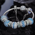 Sterling Silver Blue Horizon Harmony Charms Bracelet Set In White Gold Plated (Includes bracelet and all charms shown)