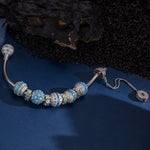 Sterling Silver Blue Horizon Harmony Charms Bracelet Set In White Gold Plated (Includes bracelet and all charms shown)