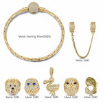 Sterling Silver Lost Wonders Charms Bracelet Set In 14K Gold Plated (Includes bracelet and all charms shown)