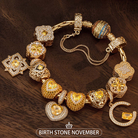 gona- Sterling Silver Song of Radiance November Birthstone Charms Bracelet Set In 14K Gold Plated (Includes bracelet and all charms shown)