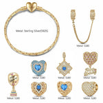 Sterling Silver Winter Celebration: December Blue Topaz Charms Bracelet Set In 14K Gold Plated (Includes bracelet and all charms shown)