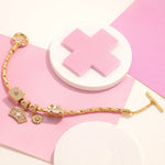 Sterling Silver Blossoms of Healing Charms Bracelet Set With Enamel In 14K Gold Plated (Includes bracelet and all charms shown)