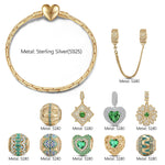 Sterling Silver May Emerald Charms Bracelet Set In 14K Gold Plated (Includes bracelet and all charms shown)