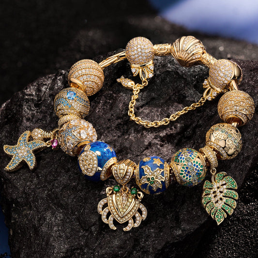gona- Sterling Silver Tropic Whisper Charms Bracelet Set In 14K Gold Plated (Includes bracelet and all charms shown)
