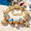Sterling Silver Tidal Treasures Charms Bracelet Set In 14K Gold Plated (Includes bracelet and all charms shown)