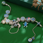 Sterling Silver Snowy Christmas Charms Bracelet Set With Enamel In White Gold Plated (Includes bracelet and all charms shown)