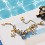 Sterling Silver Deep Sea Diving Starfish Charm Bracelet Set In 14K Gold Plated (Includes Bracelet And All Charms Shown)