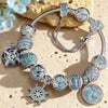 Sterling Silver Sail Across the Swells Charms Bracelet Set With Enamel In White Gold Plated (Includes bracelet and all charms shown)