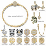 Sterling Silver Wilderness Treasures Charms Bracelet Set with Crystal from Swarovski, Featuring Dual Plating in 14K Gold and White Gold (Includes bracelet and all charms shown)