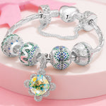 Sterling Silver Twirling in Time Charms Bracelet Set With Enamel In White Gold Plated (Includes bracelet and all charms shown)