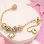 Sterling Silver Twirling in Time Charms Bracelet Set With Enamel In 14K Gold Plated (Includes bracelet and all charms shown)
