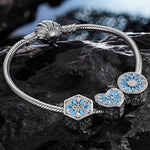 Sterling Silver Blue Ice Crystals Charms Bracelet Set In White Gold Plated (Includes bracelet and all charms shown)