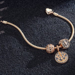 Stars of the Voyage Tarnish-resistant Silver Snake Chain Charms Bracelet Set With Enamel In Rose Gold Plated (Includes bracelet and all charms shown)